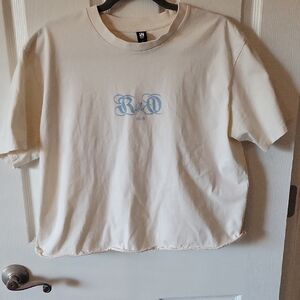 Cream T-Shirt with Blue Graphic